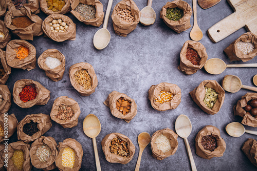 spice background, top view. Seasoning in cups. Food. Background. Spices. Herbal. Fruits. Nuts. 