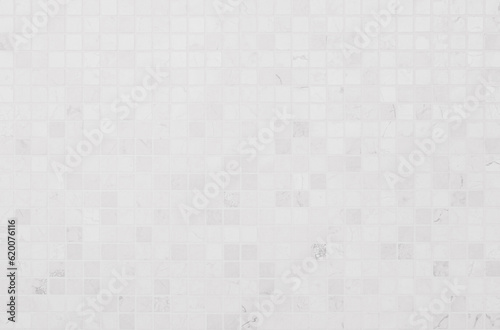 White tile wall chequered background bathroom floor texture. Ceramic wall and floor tiles mosaic background in bathroom.