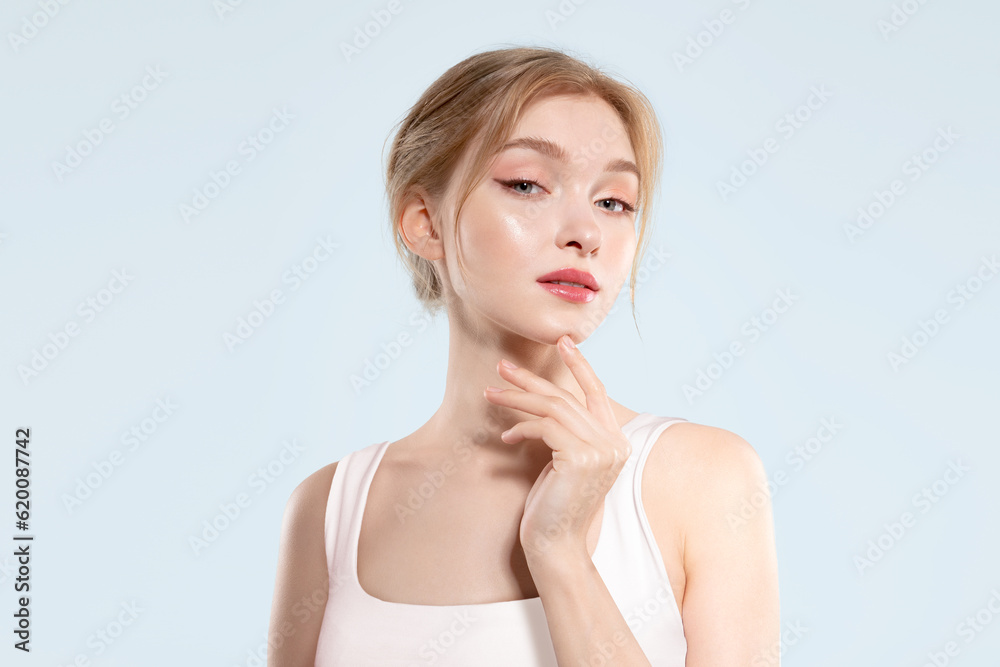 Beautiful woman with pure glowing skin, bare shoulders pleased with skincare Beautiful woman with pure glowing skin, bare shoulders pleased with skincare