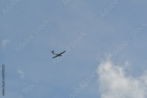 sports airplane small passing blue sky germany