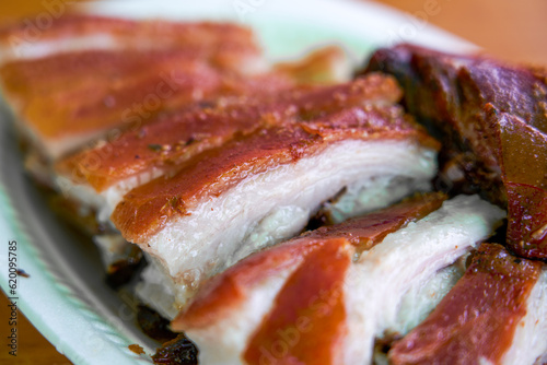 Freshly baked crispy suckling pork, a whole pig with crispy skin