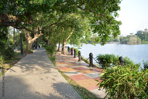Wonderful Treeshade pathway of Ravindra Sarovor Lake in the afternoon...Kolkata...India. photo