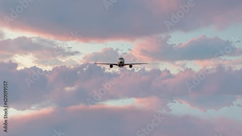 Airplane flying in the sky at sunset 3d animation