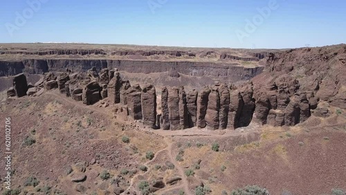 Aerial orbits massive free standing rock columns in Frenchman Coulee