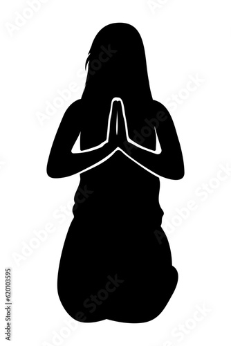 Silhouette of a Woman sitting on her knees praying. Front view