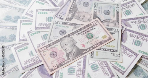 Slow rotation of a large number of dollars