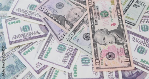 Money dollars hryvnia euros spin and fall