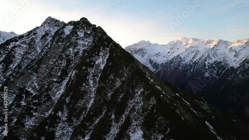 Wallpaper Mural Sunrise over snowy mountain peaks in remote Carpathian Mountains Romania Europe. Cinematic drone aerial 4k video Torontodigital.ca