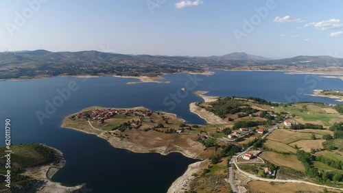 View Of The Village By The River. Vilarinho de Negrões, Portugal photo