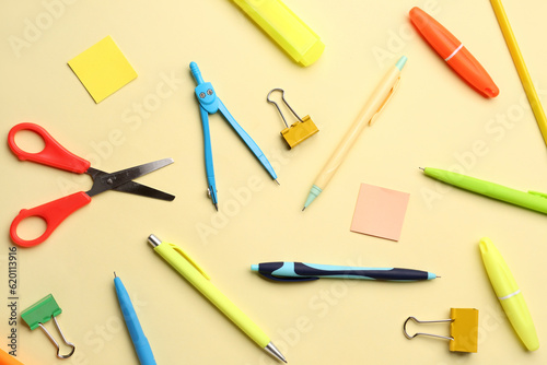 Composition with stationery supplies on yellow background © Pixel-Shot
