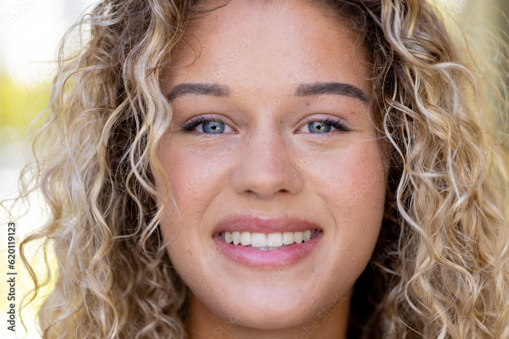 Portrait of happy caucasian woman looking at camera and smiling Portrait of happy caucasian woman looking at camera and smiling