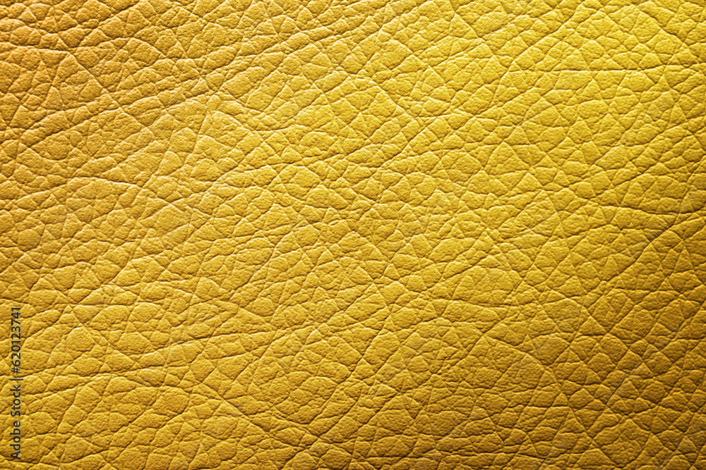 Golden textured surface as background, closeup view Golden textured surface as background, closeup view