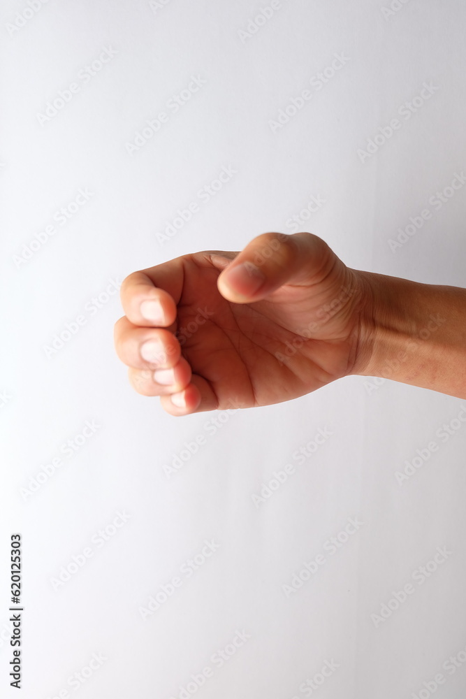 Obraz premium Hands posing holding a bottle on a white background.