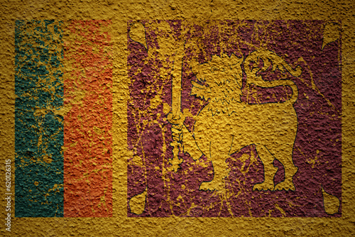 painted big national flag of sri lanka on a massive old cracked wall