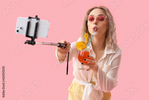 Young woman with summer coc...