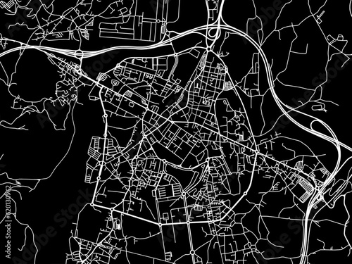 Vector road map of the city of Torrelavega in Spain on a black background.