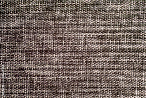 Gray texture of fabric nylon close-up macro. Grey fabric background. photo