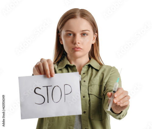 Young female junkie holding...