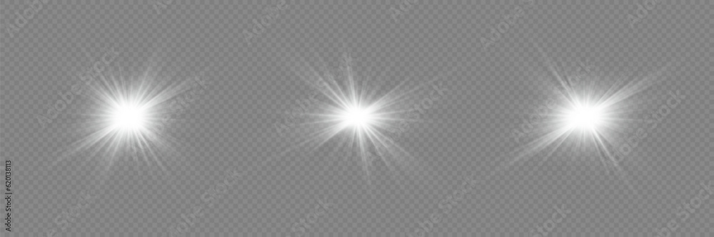 White sparkles.Bright star.Glow burst.Rays of the sun on a transparent background. White sparkles.Bright star.Glow burst.Rays of the sun on a transparent background.