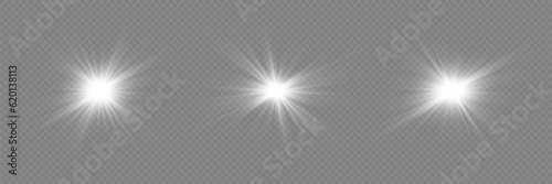 White sparkles.Bright star.Glow burst.Rays of the sun on a transparent background.