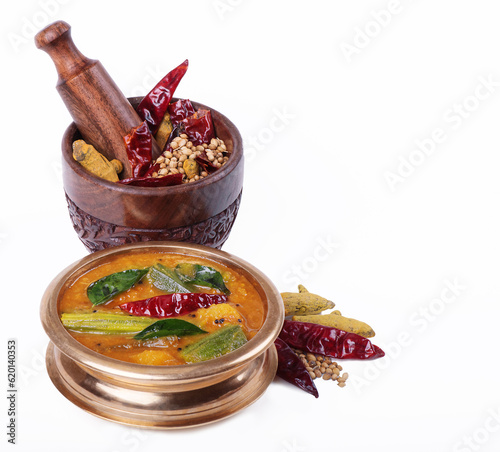 Famous south Indian curry sambar with spices photo