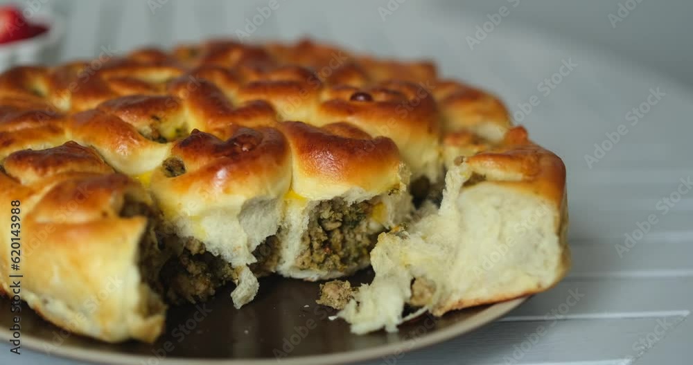 homemade meat pie, meat pastry, fresh cooked in the plate on the table might be cafeteria. High quality 4k footage homemade meat pie, meat pastry, fresh cooked in the plate on the table might be cafeteria. High quality 4k footage