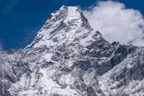Ama Dablam is one of the most beautiful mountains in the world standing at an elevation of 6,812 metres (22,349 ft). Mother's necklace or Ama dablam mountain seeing from Ama Dablam base camp in Nepal.