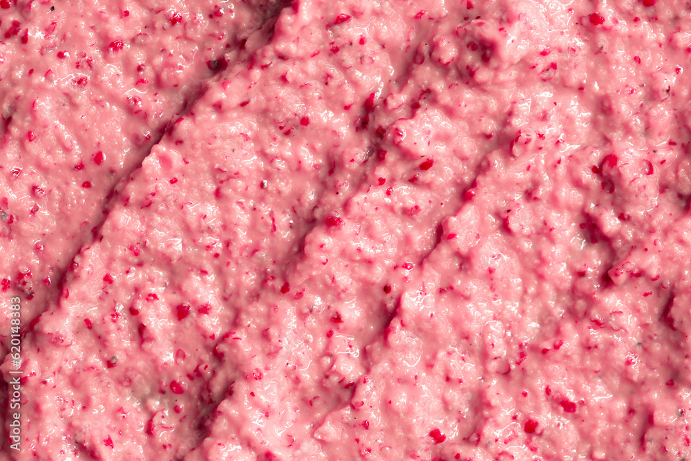 Berry yoghurt ice cream. Smoothies from fresh fruits and berries. Ice cream texture. Delicious sweet dessert close-up as a background. Berry yoghurt ice cream. Smoothies from fresh fruits and berries. Ice cream texture. Delicious sweet dessert close-up as a background.