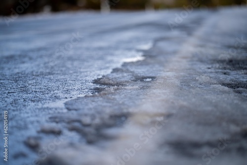 ice on the road on a mountain in winter photo