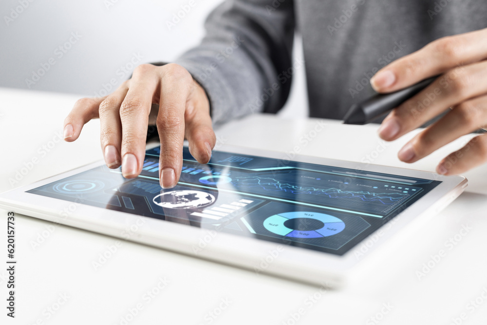 Businesswoman using tablet computer for news read