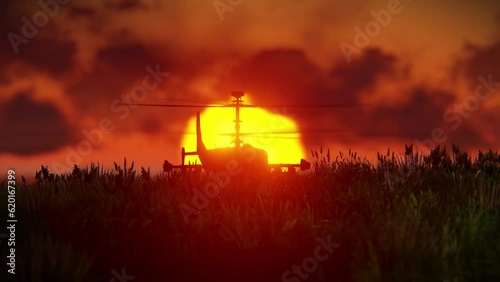 Ka-52 Hokum takes off at sunset, heat haze