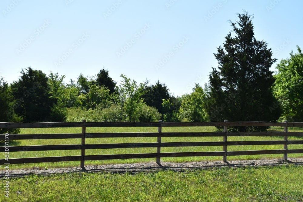 Wooden Fence in a Farm Field