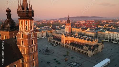 krakow city old town aerial view drone at sunrise,flying over saint mary basilica market square  photo