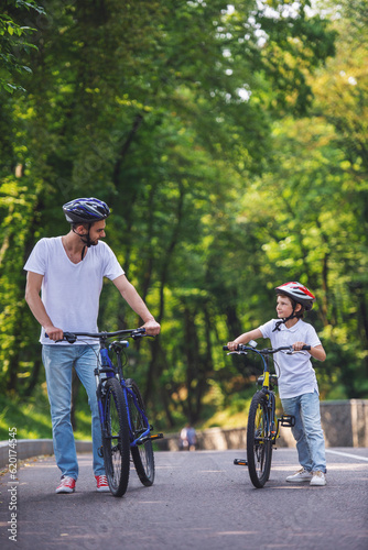 Dad and son cycling