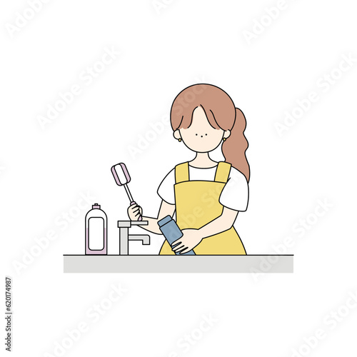 水筒を洗う女の子
