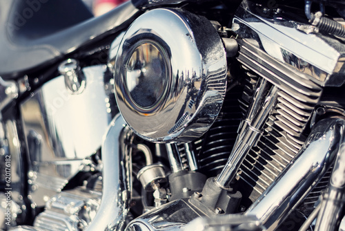 Close up of the headlight and bonnet on a vintage motorcycle