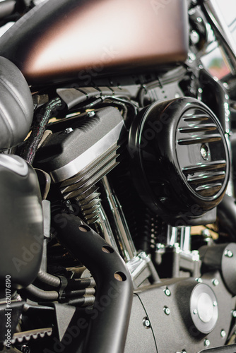 Close up of the engine of a modern chopper motorbike. © WeźTylkoSpójrz