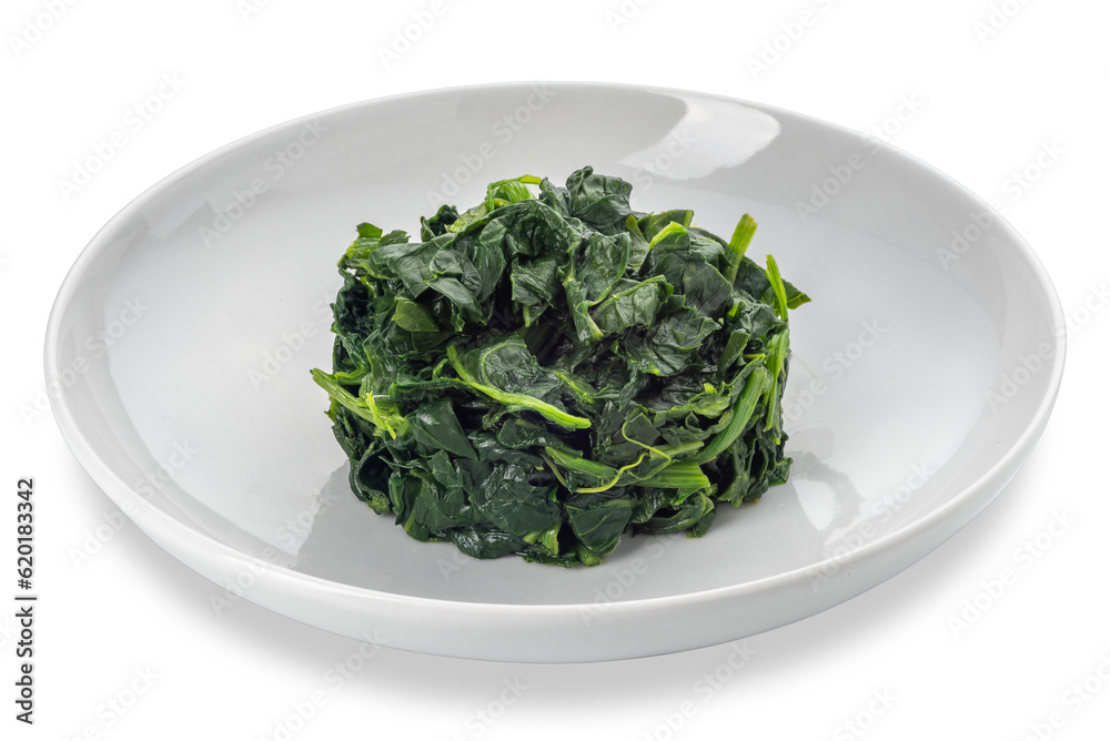 Spinach cooked in white dish isolated Spinach cooked in white dish isolated