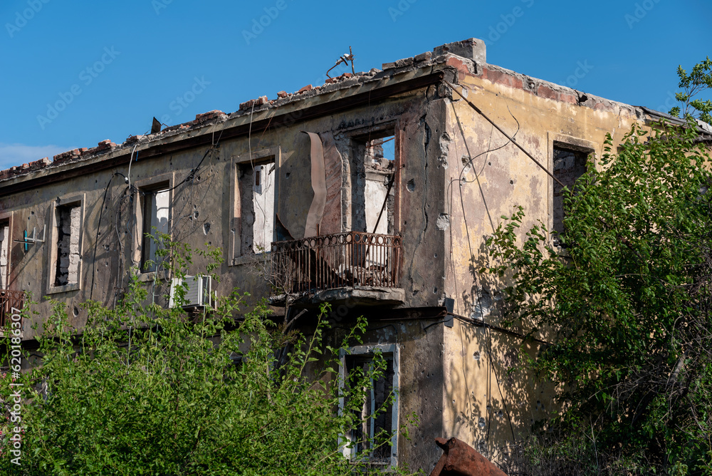 destroyed houses in an abandoned city without people in Ukraine destroyed houses in an abandoned city without people in Ukraine