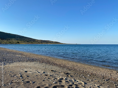 Guzelce beach, which is very close to Kefalos (Aydincik) beach. Güzelce Bay is also one of the suitable beaches for windsurf and kitesurfing in Gokceada. photo