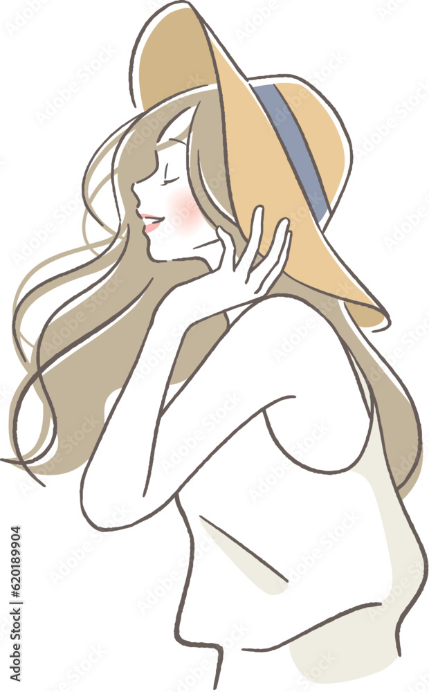 帽子をかぶる笑顔の女性 帽子をかぶる笑顔の女性