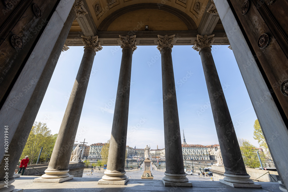 TORINO (TURIN), ITALY, APRIL 11, 2023 - View of Turin through the columns of Gran Madre di Dio Church in Turin (Torino), Piedmont, Italy