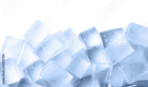 Many clear ice cubes on white background, top view