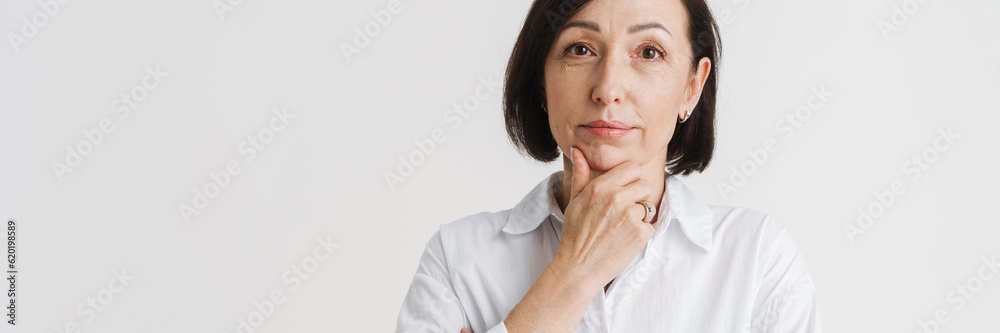 European mature woman looking and posing at camera European mature woman looking and posing at camera