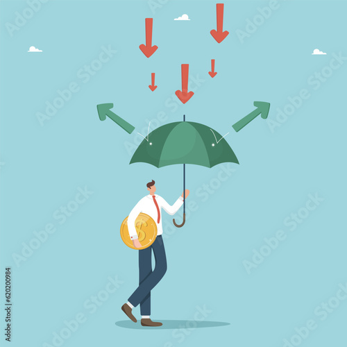 Overcoming financial difficulties and failures, ways and methods to maintain business profitability during economic downturn or crisis, man with coin stands under umbrella on which arrows are pouring.