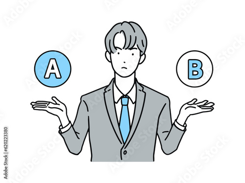 ABの選択肢を考えるビジネスパーソン(会社員)男性