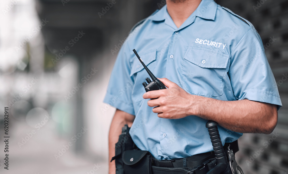 Walkie talkie, security guard or safety officer man on the street for