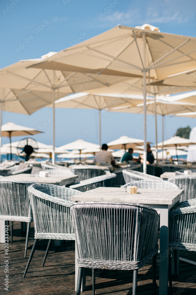 Fototapeta premium Beach cafe in a summer sunny day near the old town of Budva, Montenegro.