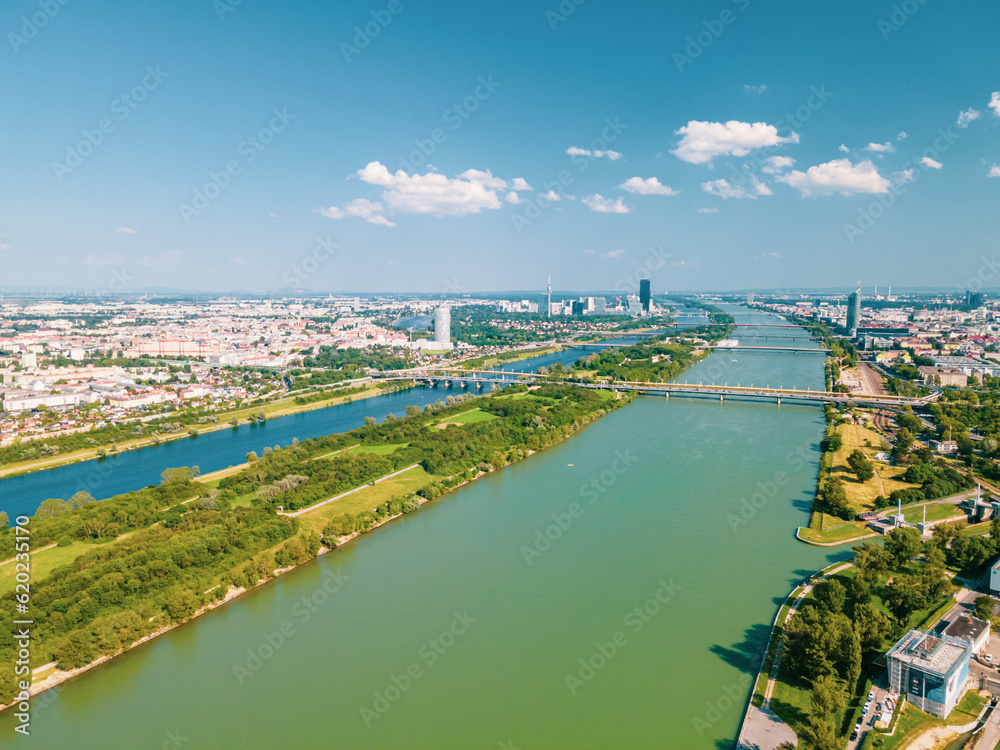 Aerial drone view of Danube river in Vienna Austria cityscape with danube island