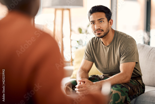 Listen, therapy and a military man with a psychologist for counselling, support and psychology. Young army, veteran or soldier person on therapist couch for mental health, consultation or help photo